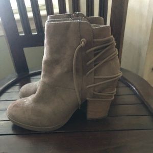 Suede Ankle boots with zip up with detailed lacing on the back.